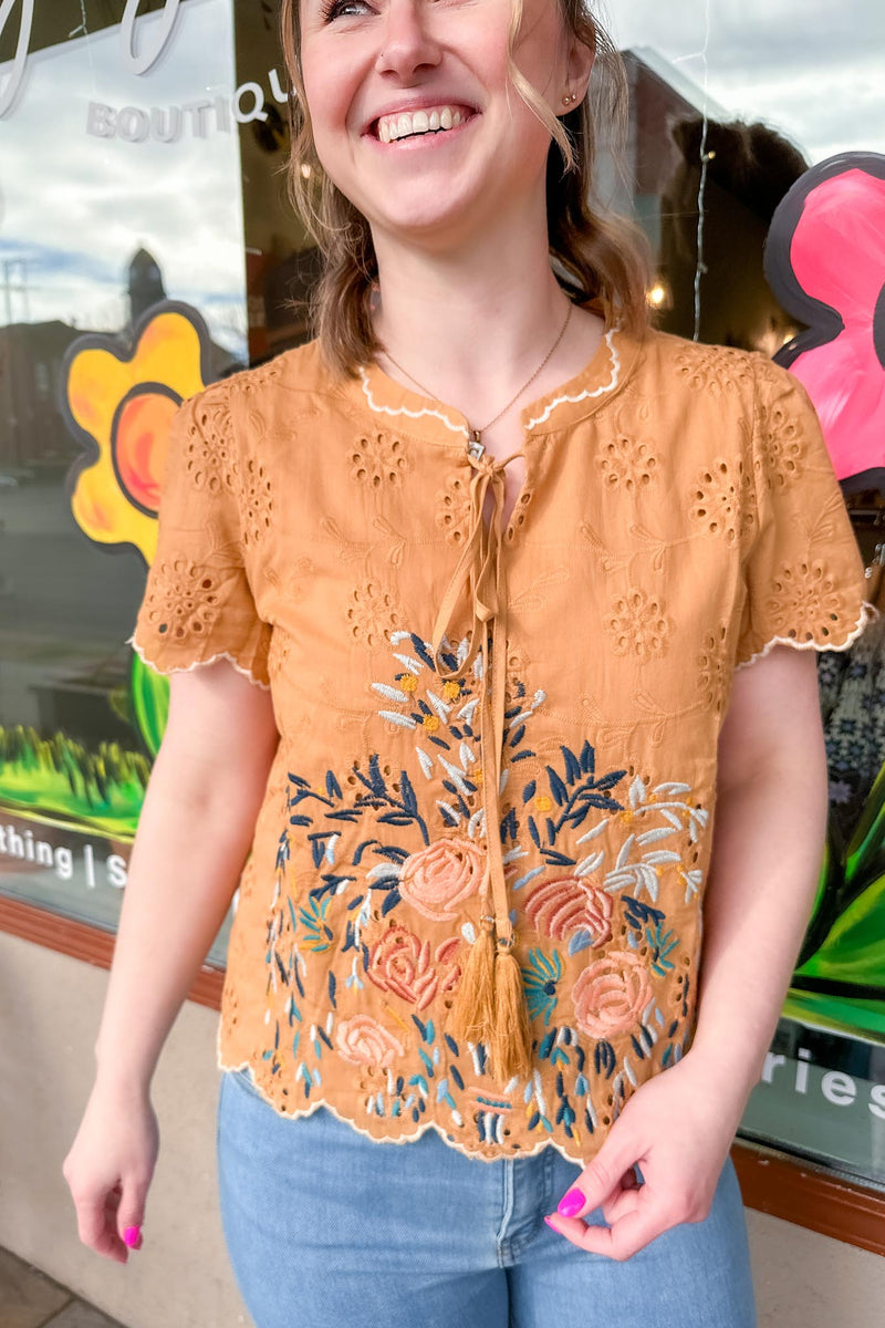 girl wearing a CARAMEL LACE EMBROIDERED TOP