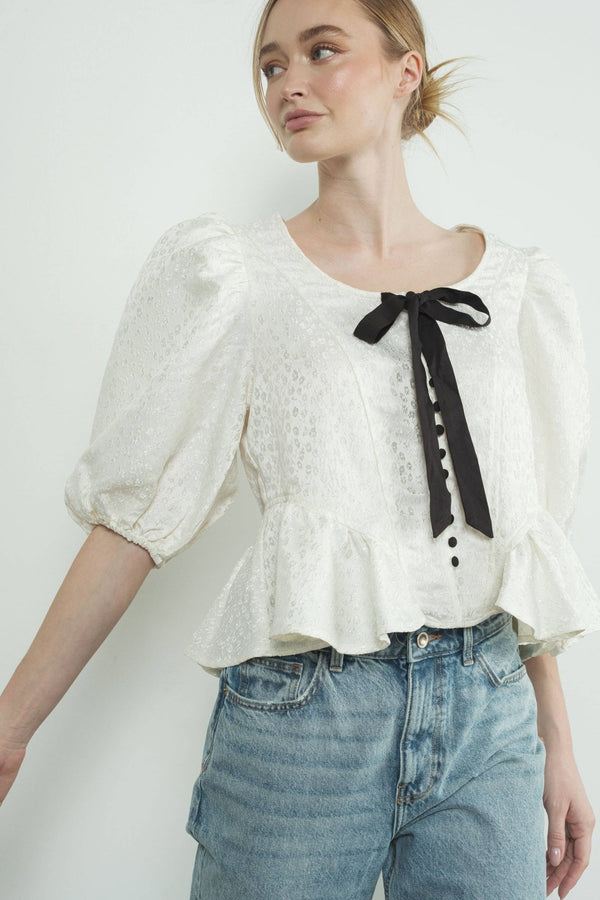 MAT3188 JACQUARD PUFFY SLEEVE BOW TIE TOP W/RUFFLE HEM - Aaron & Amber - Terra Cotta Gorge Co.