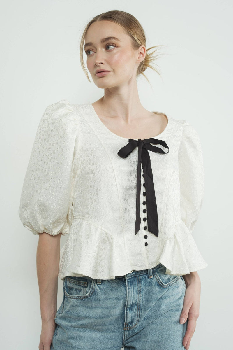 MAT3188 JACQUARD PUFFY SLEEVE BOW TIE TOP W/RUFFLE HEM - Aaron & Amber - Terra Cotta Gorge Co.