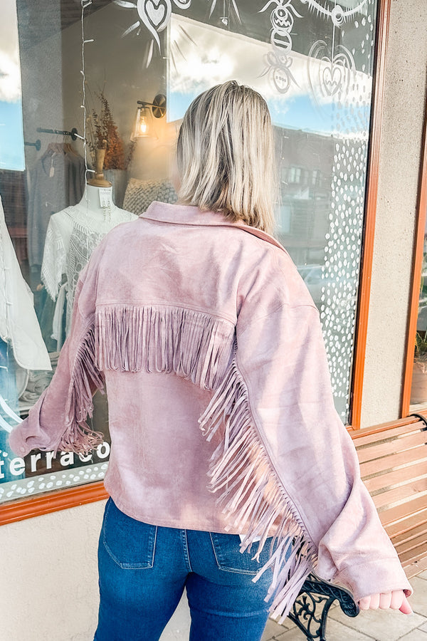 girl wearing a Mauve Suede Fringe Jacket back view 